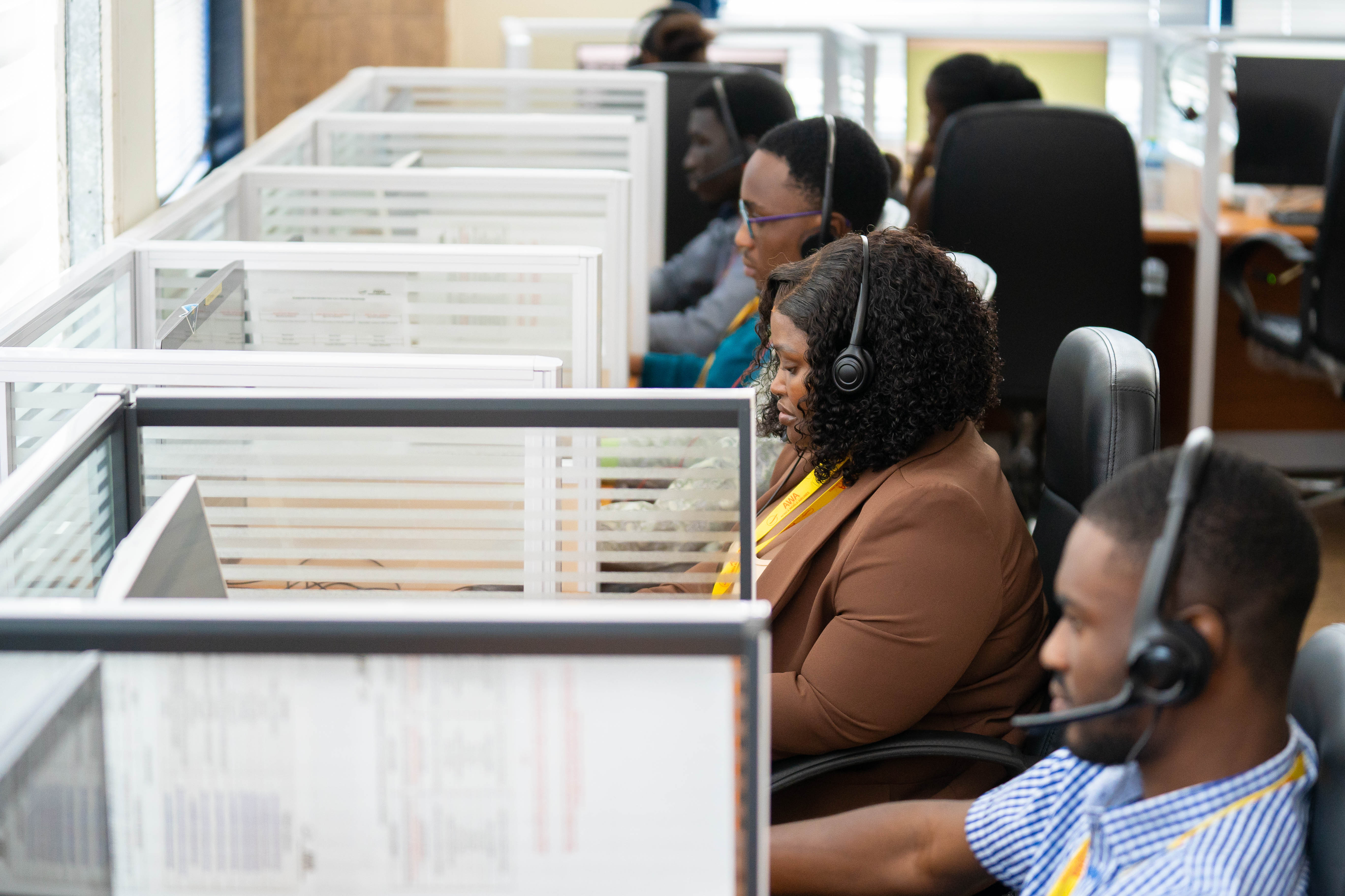 Friendly support representative on a laptop